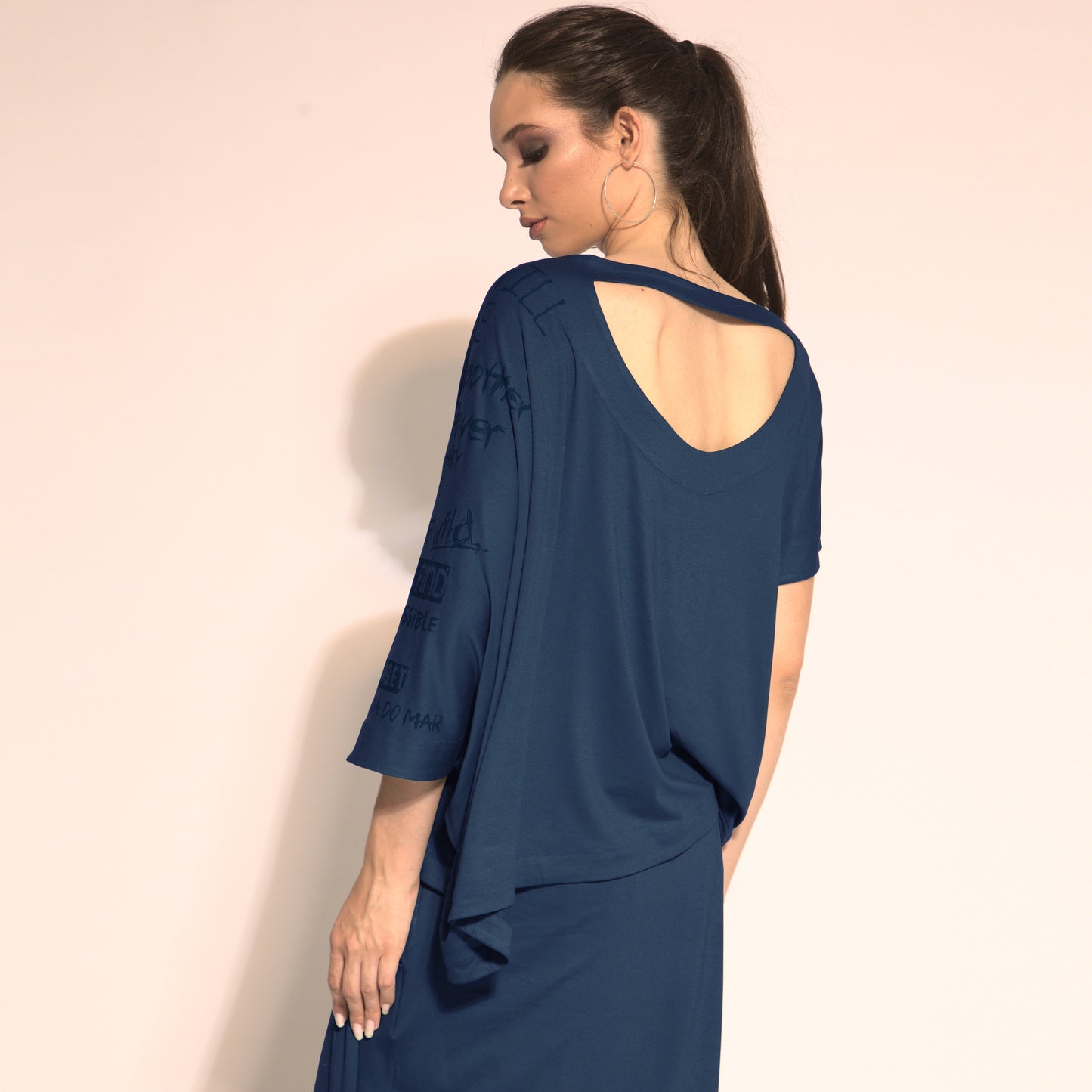Betina - cut-out asymmetrical blouse