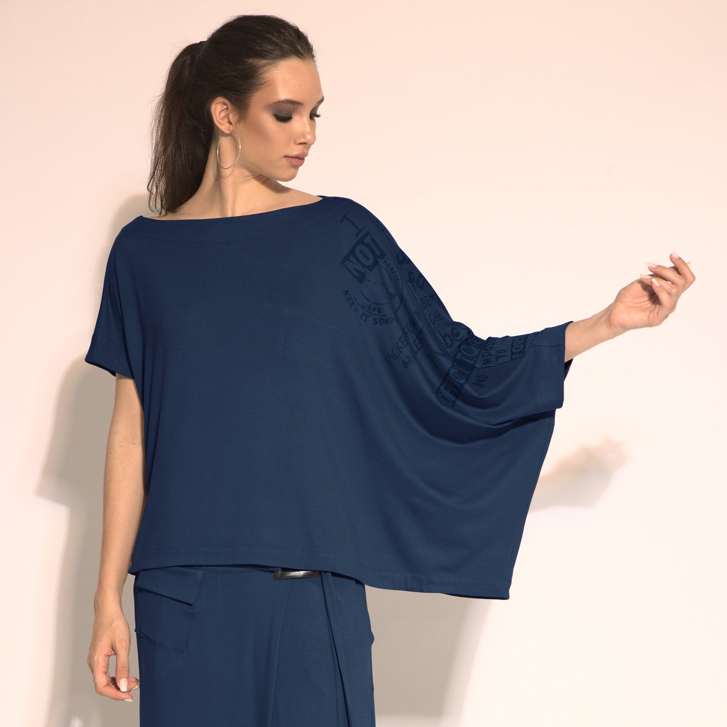 Betina - cut-out asymmetrical blouse