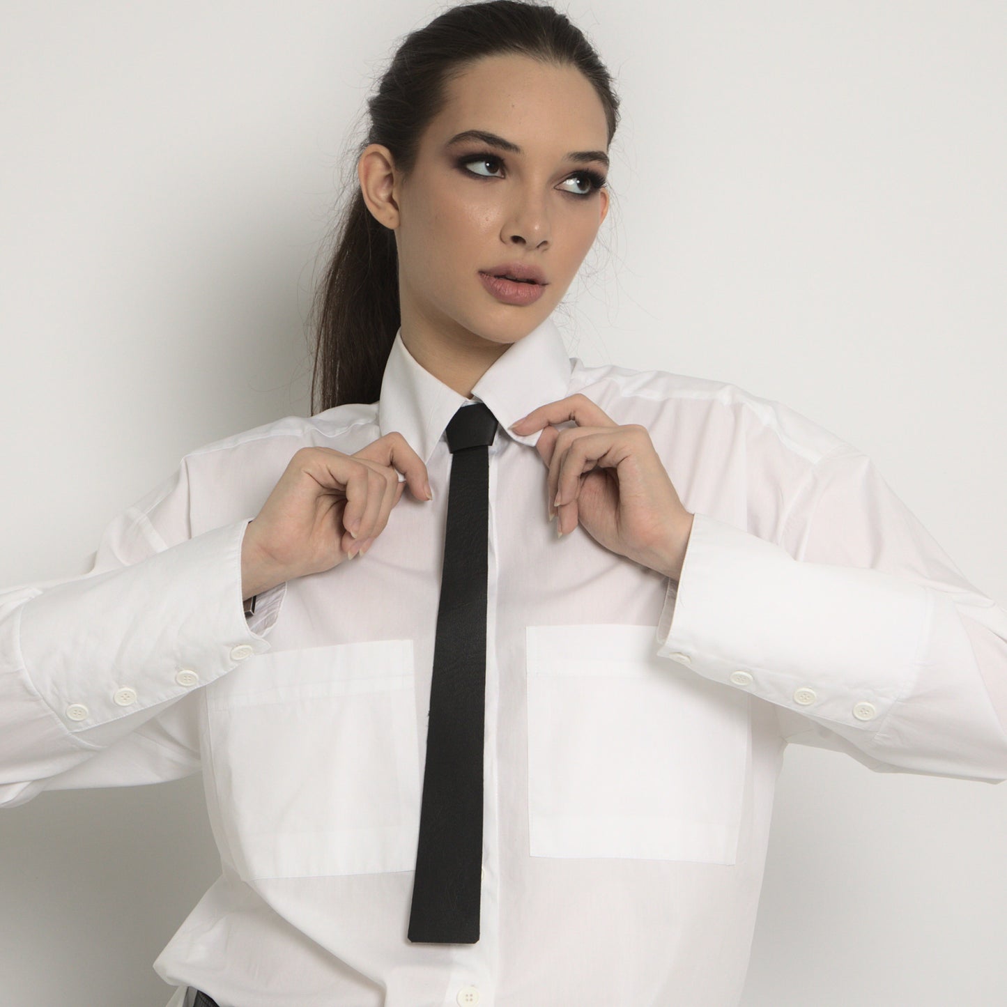 Leather tie with metal fastening