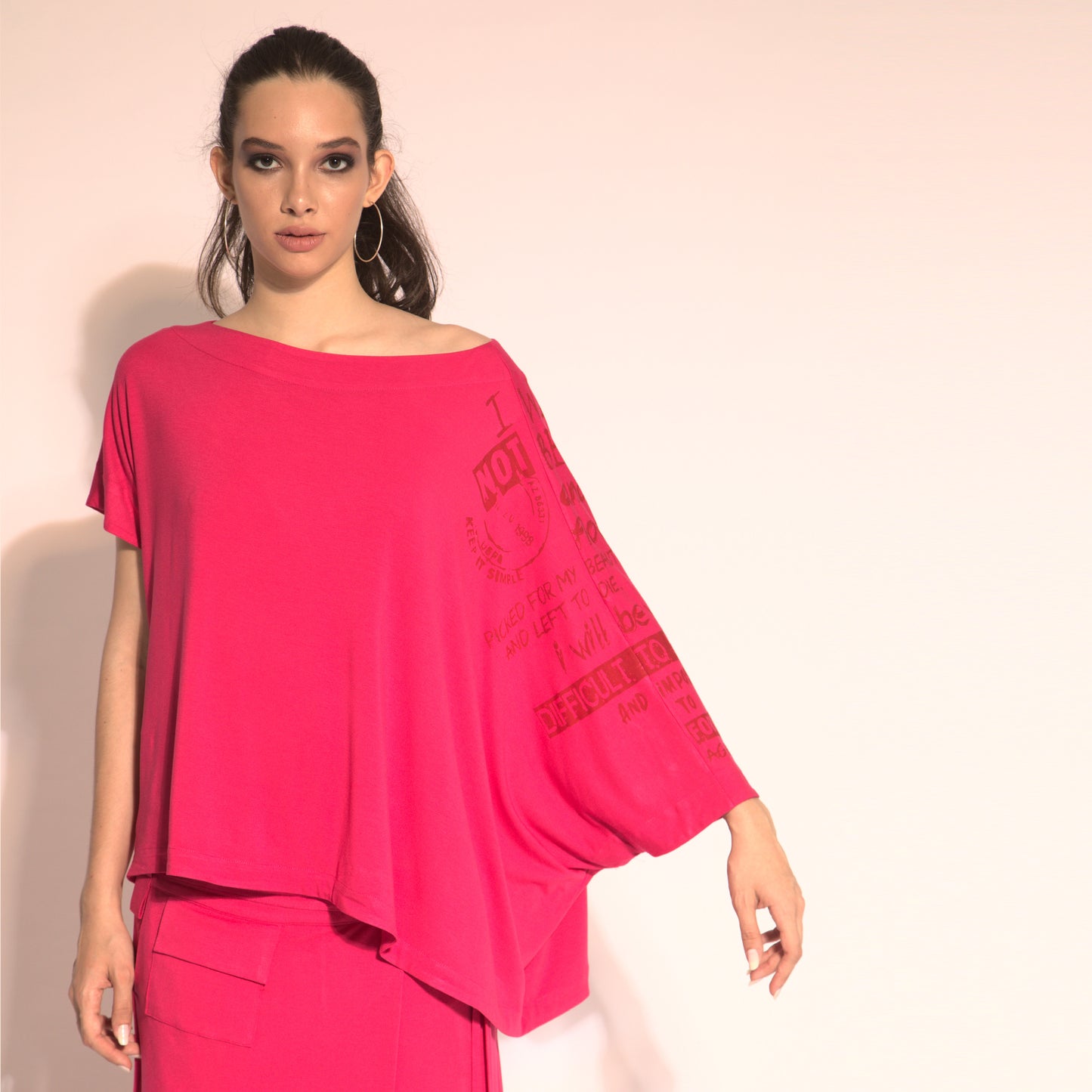 Betina - cut-out asymmetrical blouse