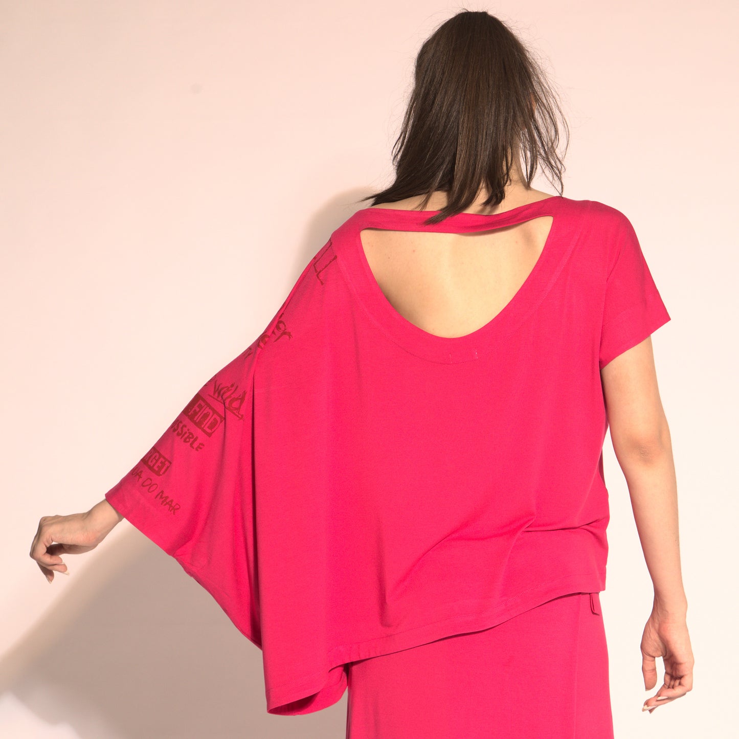 Betina - cut-out asymmetrical blouse