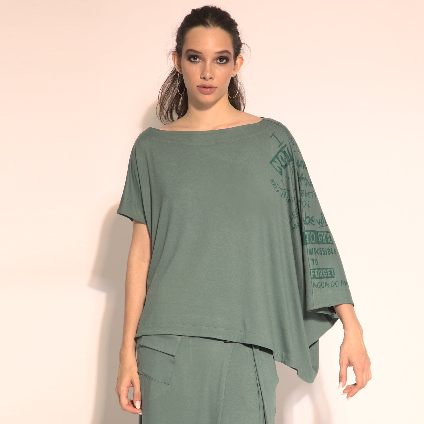 Betina - cut-out asymmetrical blouse