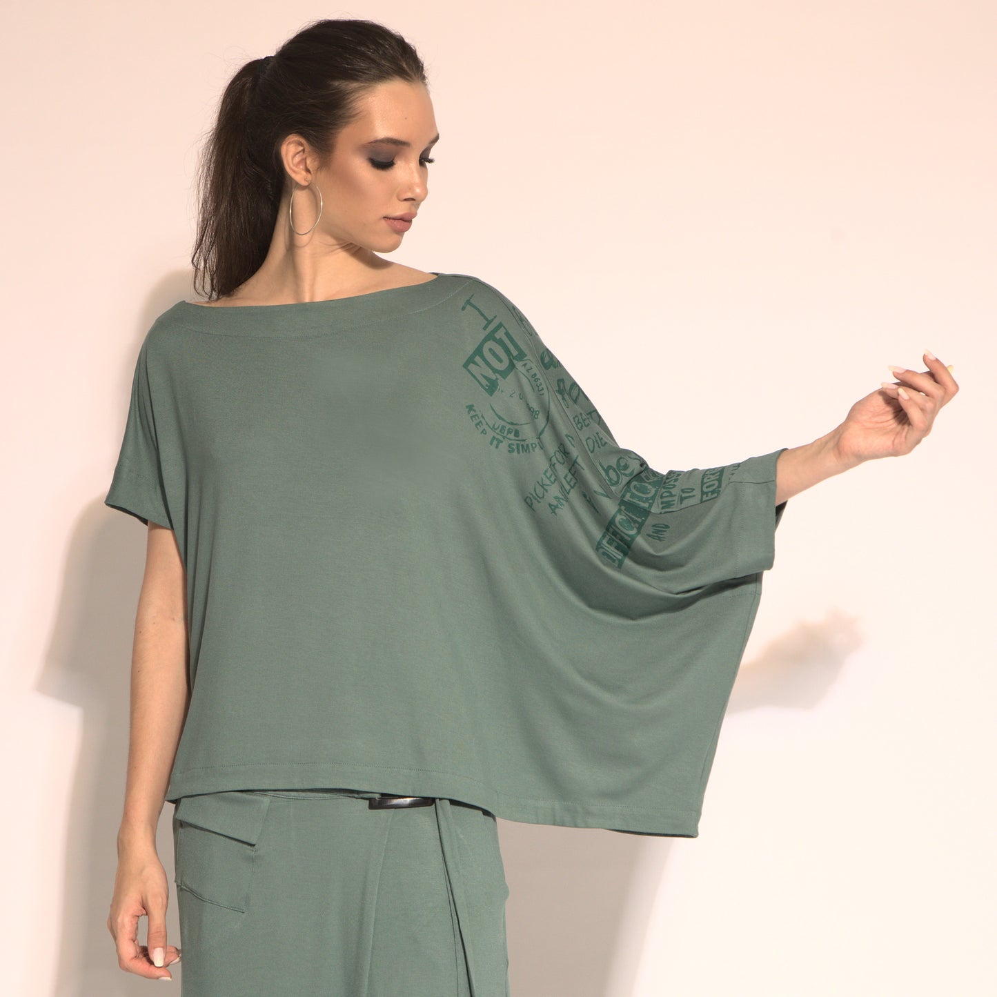 Betina - cut-out asymmetrical blouse