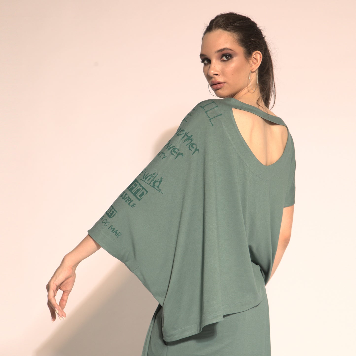 Betina - cut-out asymmetrical blouse