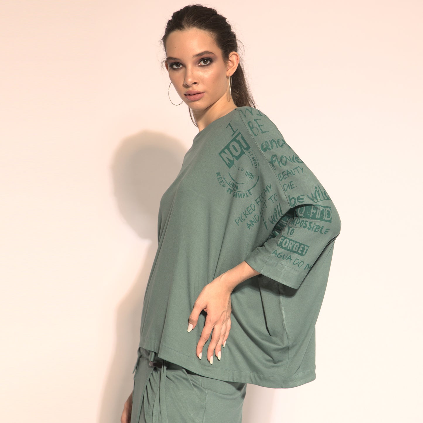 Betina - cut-out asymmetrical blouse