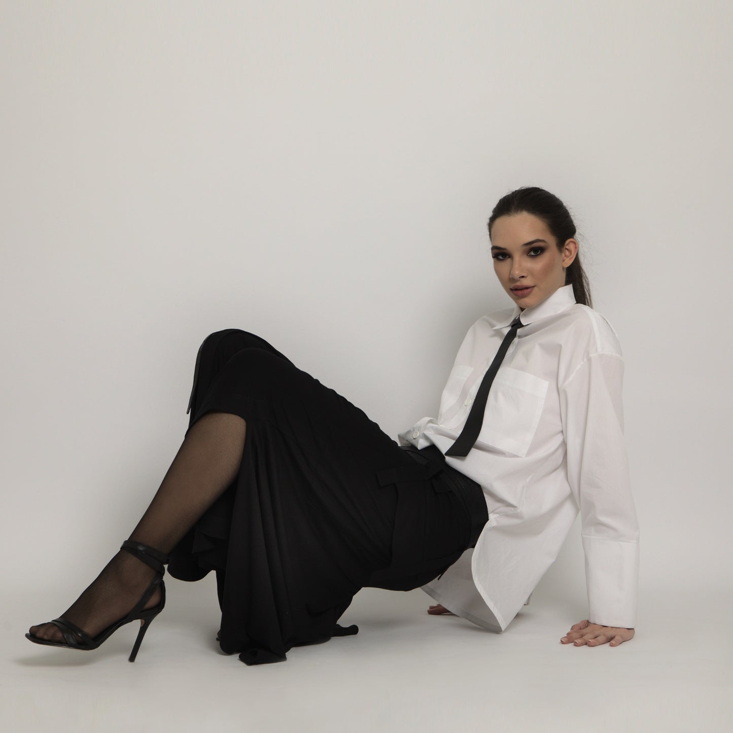 Leather tie with metal fastening