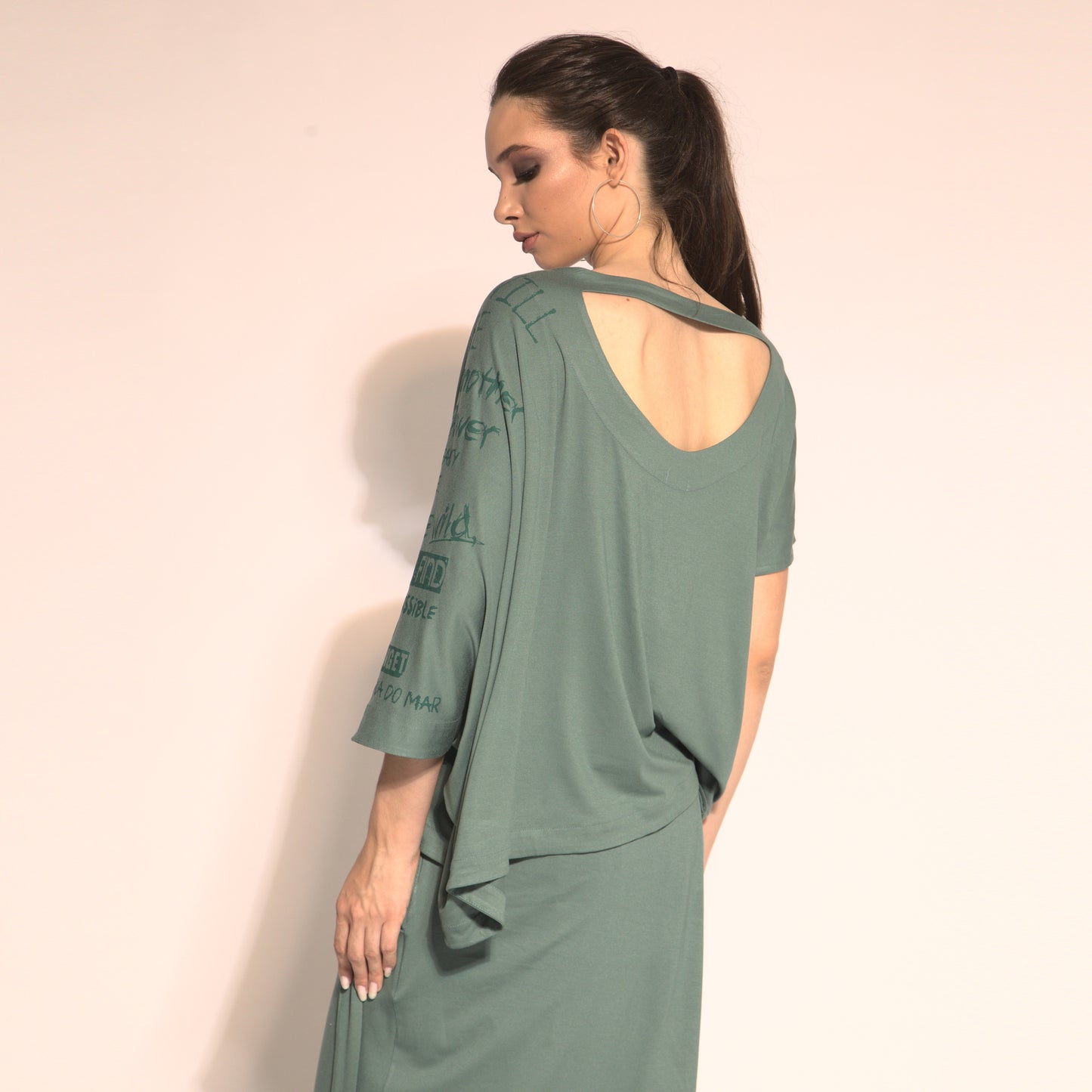 Betina - cut-out asymmetrical  blouse